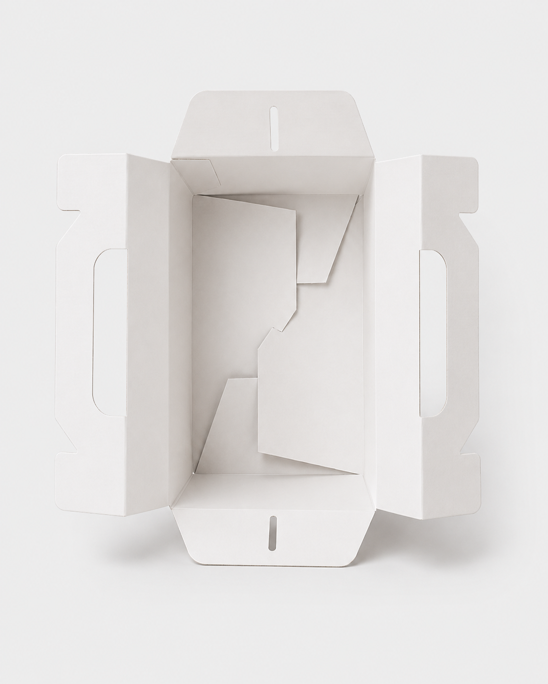 Caja maletín abierta — interior blanco y montaje automático