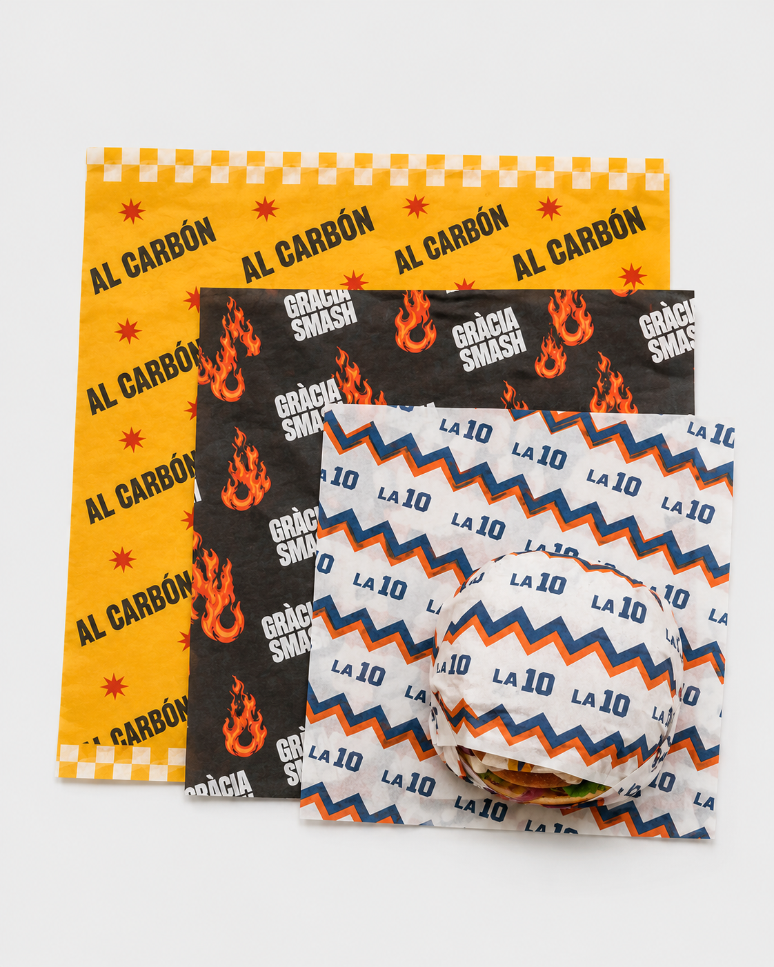 Papel sulfurizado personalizado — diseños Al Carbón, Gràcia Smash y LA 10